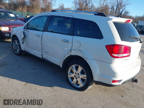 2013 Dodge Journey Crew with VIN 3C4PDCDG3DT521556, listed as a IAAI auction lot 41852888 with 209,562 mi miles and . Bid and sale history available at DreamBid. Image 3.