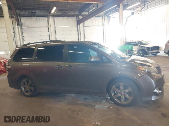2011 Toyota Sienna SE with VIN 5TDXK3DC7BS034516, listed as a IAAI auction lot 41539955 with 209,309 mi miles. Bid and sale history available at carsss.com. Image 13.