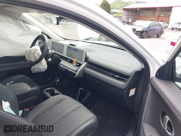 2022 Hyundai Ioniq 5 SEL with VIN KM8KN4AE4NU090938, listed as a IAAI auction lot 42507220 with 15,266 mi miles and . Bid and sale history available at DreamBid. Image 5.