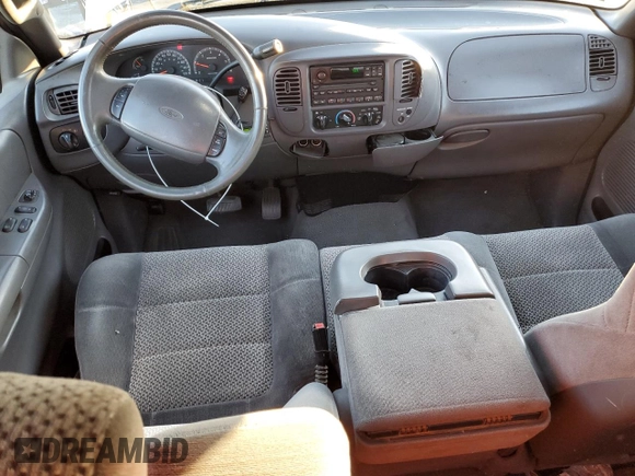 2001 Ford F-150 XL with VIN 2FTRX07L51CA91232, listed as a Copart auction lot 88556635 with 268,582 mi miles and Salvage Title. Bid and sale history available at carsss.com. Image 8.