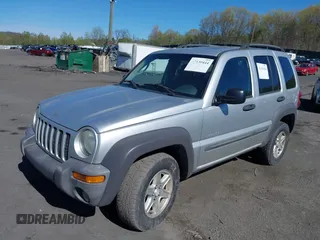 2004 Jeep Liberty Sport with VIN 1J4GL48K84W130852, listed as a IAAI auction lot 42130444 with 99,188 mi miles. Bid and sale history available at carsss.com. Image 2.