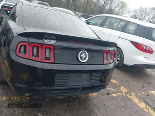 2013 Ford Mustang V6 with VIN 1ZVBP8AM9D5253490, listed as a IAAI auction lot 41856886 with 236,348 mi miles and . Bid and sale history available at DreamBid. Image 16.