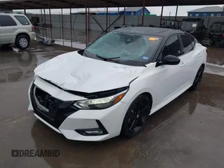 2023 Nissan Sentra SR z VIN 3N1AB8DV4PY277885, wystawiony jako IAAI lot #41553949 z przebiegiem 21 433 mil mil oraz . Historia ofert i sprzedaży dostępna na DreamBid. Obrazek 2.