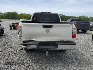 2017 Nissan Titan SV z VIN 1N6AA1EJ2HN570490, wystawiony jako Copart lot #50688785 z przebiegiem 122 817 mil mil oraz Szkoda całkowita • Salvage title. Historia ofert i sprzedaży dostępna na DreamBid. Obrazek 6.