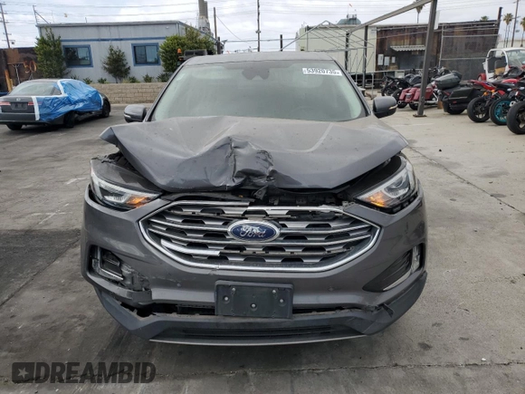2021 Ford Edge Titanium with VIN 2FMPK4K96MBA16599, listed as a Copart auction lot 53920735 with 71,376 mi miles and Salvage title. Bid and sale history available at DreamBid. Image 5.