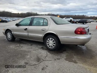 2001 Lincoln Continental with VIN 1LNHM97V41Y633841, listed as a Copart auction lot 86695664 with 166,931 mi miles and Salvage Title. Bid and sale history available at carsss.com. Image 2.