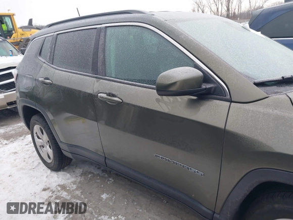 2018 Jeep Compass Altitude with VIN 3C4NJDBB1JT479462, listed as a IAAI auction lot 41276119 with 58,895 mi miles and . Bid and sale history available at carsss.com. Image 13.
