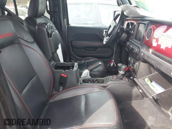 2020 Jeep Wrangler Unlimited Rubicon z VIN 1C4HJXFN8LW176002, wystawiony jako IAAI lot #41662158 z przebiegiem 55 924 mil mil oraz . Historia ofert i sprzedaży dostępna na DreamBid. Obrazek 5.