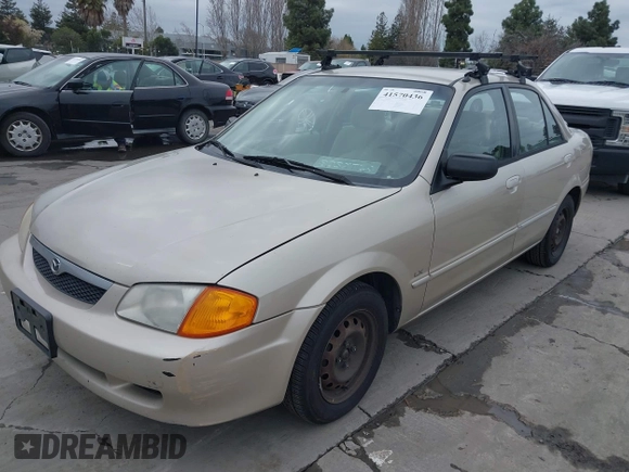 2000 Mazda Protege DX with VIN JM1BJ2223Y0212144, listed as a IAAI auction lot 41570436 with 221,430 mi miles and . Bid and sale history available at DreamBid. Image 6.