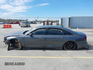 2022 Audi S8 with VIN WAULSAF83NN001905, listed as a IAAI auction lot 41813861 with 18,461 mi miles and . Bid and sale history available at DreamBid. Image 13.