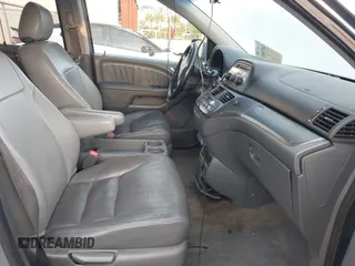 2007 Honda Odyssey EX-L z VIN 5FNRL38717B035384, wystawiony jako IAAI lot #41976861 z przebiegiem 211 640 mil mil oraz . Historia ofert i sprzedaży dostępna na DreamBid. Obrazek 5.