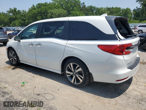 2023 Honda Odyssey Touring with VIN 5FNRL6H84PB016614, listed as a Copart auction lot 59336585 with 36,932 mi miles and Salvage title. Bid and sale history available at DreamBid. Image 2.