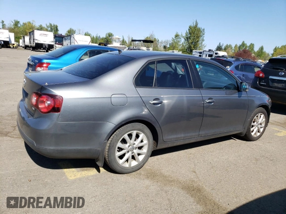 2010 Volkswagen Jetta SE z VIN 3VWRX7AJ4AM129714, wystawiony jako Copart lot #52975835 z przebiegiem 166 554 mil mil oraz Szkoda całkowita • Salvage title. Historia ofert i sprzedaży dostępna na DreamBid. Obrazek 3.