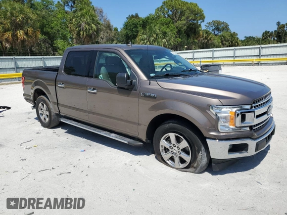 2018 Ford F-150 XL with VIN 1FTEW1CG4JKC38569, listed as a Copart auction lot 54779805 with 97,190 mi miles and Salvage Title. Bid and sale history available at carsss.com. Image 4.