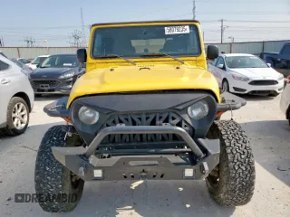 2003 Jeep Wrangler Sport with VIN 1J4FA49S43P369906, listed as a Copart auction lot 58079235 with 139,547 mi miles and Salvage title. Bid and sale history available at DreamBid. Image 5.