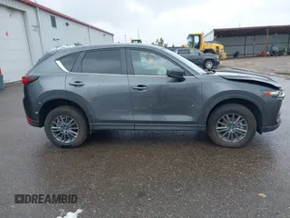 2021 Mazda CX-5 Touring with VIN JM3KFBCM8M0311433, listed as a IAAI auction lot 40554094 with 23,319 mi miles. Bid and sale history available at carsss.com. Image 13.