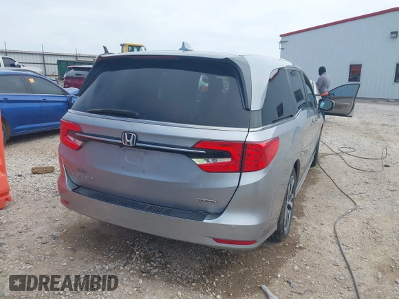 2021 Honda Odyssey Touring with VIN 5FNRL6H8XMB034837, listed as a IAAI auction lot 41856444 with 84,950 mi miles. Bid and sale history available at carsss.com. Image 4.