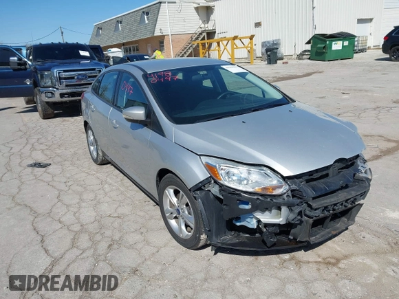 2013 Ford Focus SE z VIN 1FADP3F23DL306241, wystawiony jako IAAI lot #41980497 z przebiegiem 63 313 mil mil oraz . Historia ofert i sprzedaży dostępna na DreamBid. Obrazek 1.