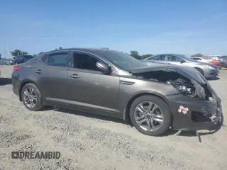 2013 Kia Optima EX z VIN 5XXGN4A77DG199443, wystawiony jako Copart lot #62406035 z przebiegiem 171 081 mil mil oraz Szkoda całkowita • Salvage title. Historia ofert i sprzedaży dostępna na DreamBid. Obrazek 4.