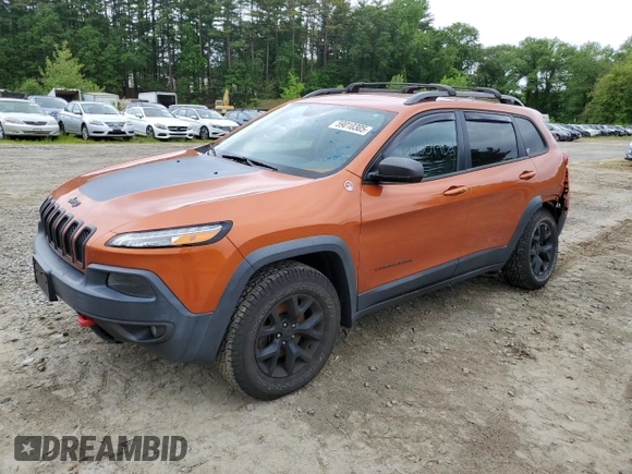 2016 Jeep Cherokee Trailhawk with VIN 1C4PJMBS2GW255368, listed as a Copart auction lot 59010305 with 105,667 mi miles and Salvage title. Bid and sale history available at DreamBid. Image 1.