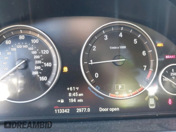 2013 BMW 5 Series 528i with VIN WBAXG5C55DD233592, listed as a IAAI auction lot 41827491 with 113,342 mi miles and . Bid and sale history available at carsss.com. Image 7.