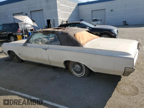 1964 Oldsmobile Cutlass with VIN 824F023233, listed as a Copart auction lot 75574234 with 90,534 mi miles and Clean Title. Bid and sale history available at DreamBid. Image 2.