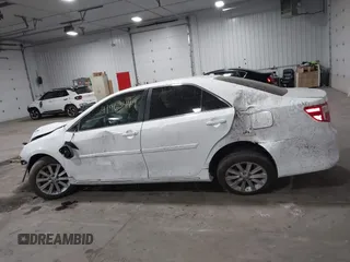 2014 Toyota Camry L with VIN 4T1BF1FK4EU734657, listed as a IAAI auction lot 41963449 with 167,826 mi miles. Bid and sale history available at carsss.com. Image 14.