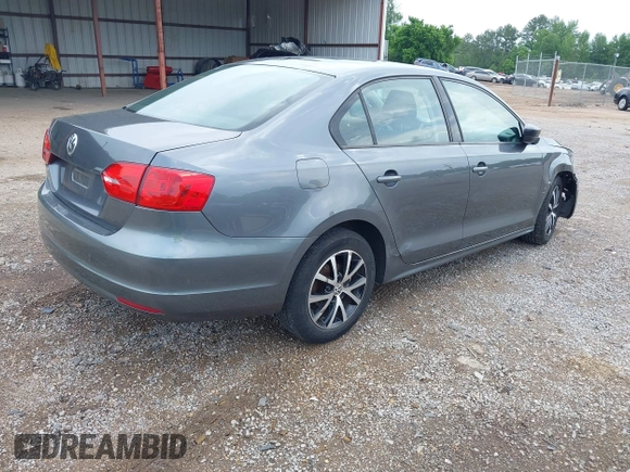 2013 Volkswagen Jetta S z VIN 3VW2K7AJ5DM369293, wystawiony jako IAAI lot #42172959 z przebiegiem 170 983 mil mil oraz . Historia ofert i sprzedaży dostępna na DreamBid. Obrazek 4.