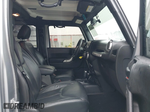 2017 Jeep Wrangler Unlimited Sahara with VIN 1C4BJWEG8HL681775, listed as a IAAI auction lot 42424924 with 87,068 mi miles and . Bid and sale history available at DreamBid. Image 5.