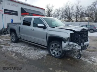 2018 GMC Sierra 1500 Denali with VIN 3GTU2PEJXJG472435, listed as a IAAI auction lot 41376821 with 63,177 mi miles. Bid and sale history available at carsss.com. Image 1.
