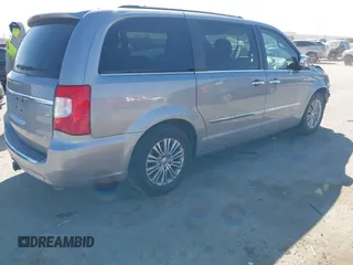 2014 Chrysler Town & Country Touring-L with VIN 2C4RC1CG7ER234517, listed as a IAAI auction lot 41824484 with 190,245 mi miles. Bid and sale history available at carsss.com. Image 4.