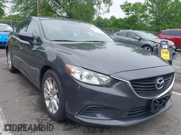 2014 Mazda 6 i Sport with VIN JM1GJ1U52E1102800, listed as a IAAI auction lot 42266283 with 103,886 mi miles and . Bid and sale history available at DreamBid. Image 1.