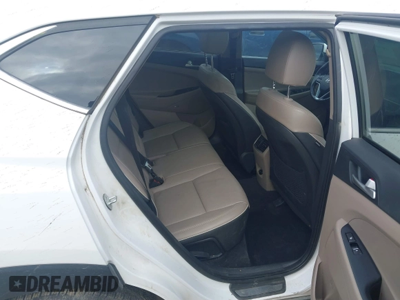 2019 Hyundai Tucson Ultimate with VIN KM8J3CALXKU016834, listed as a IAAI auction lot 40970606 with 104,208 mi miles. Bid and sale history available at carsss.com. Image 8.
