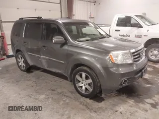 2012 Honda Pilot Touring with VIN 5FNYF4H98CB030879, listed as a IAAI auction lot 41619003 with 201,131 mi miles. Bid and sale history available at carsss.com. Image 1.
