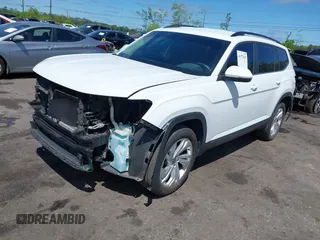 2021 Volkswagen Atlas SE z VIN 1V2WR2CA2MC529355, wystawiony jako IAAI lot #41972048 z przebiegiem 63 970 mil mil oraz . Historia ofert i sprzedaży dostępna na DreamBid. Obrazek 17.
