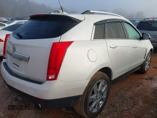 2011 Cadillac SRX Performance Collection with VIN 3GYFNBEY4BS600709, listed as a IAAI auction lot 40858453 with 148,769 mi miles. Bid and sale history available at carsss.com. Image 4.