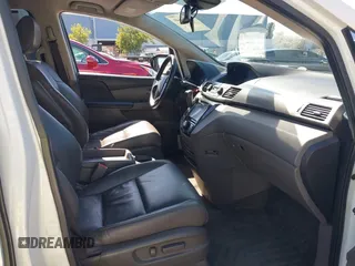 2015 Honda Odyssey Touring Elite with VIN 5FNRL5H91FB038099, listed as a IAAI auction lot 41829649 with 167,017 mi miles and . Bid and sale history available at DreamBid. Image 5.