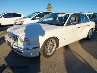 2007 Jaguar XJ with VIN SAJWA71B17SH12746, listed as a IAAI auction lot 41401422 with 99,735 mi miles. Bid and sale history available at carsss.com. Image 2.