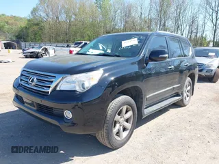 2013 Lexus GX 460 Premium z VIN JTJJM7FX8D5063276, wystawiony jako IAAI lot #41922536 z przebiegiem 162 110 mil mil oraz . Historia ofert i sprzedaży dostępna na DreamBid. Obrazek 19.