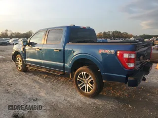 2023 Ford F-150 XL with VIN 1FTFW1E51PKF30933, listed as a Copart auction lot 82439694 with 26,267 mi miles and Salvage Title. Bid and sale history available at carsss.com. Image 2.