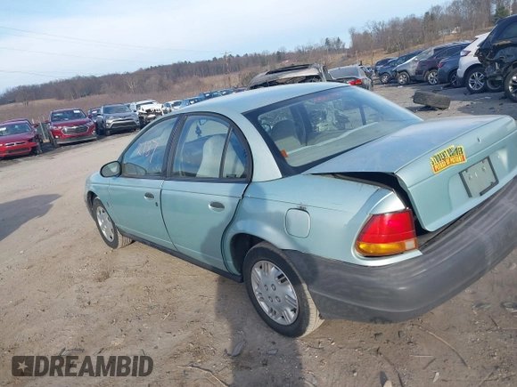 1997 Saturn SL with VIN 1G8ZH528XVZ196784, listed as a IAAI auction lot 41662187 with 112,278 mi miles. Bid and sale history available at carsss.com. Image 3.