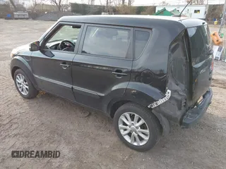 2012 Kia Soul + with VIN KNDJT2A69C7747537, listed as a IAAI auction lot 41895784 with 63,151 mi miles. Bid and sale history available at carsss.com. Image 3.