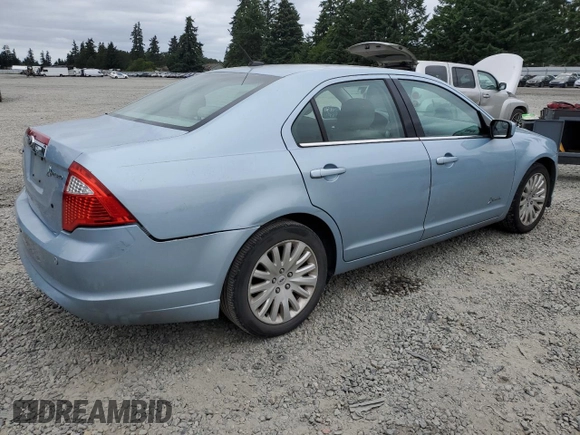 2011 Ford Fusion Hybrid with VIN 3FADP0L39BR274387, listed as a Copart auction lot 60657425 with 118,898 mi miles and Salvage title. Bid and sale history available at DreamBid. Image 3.