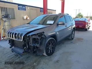 2015 Jeep Cherokee Latitude with VIN 1C4PJLCB1FW770806, listed as a IAAI auction lot 41887226 with 71,268 mi miles and . Bid and sale history available at DreamBid. Image 2.