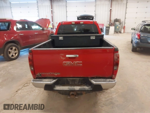 2011 GMC Canyon z VIN 1GTJ6NFE1B8109333, wystawiony jako IAAI lot #42035352 z przebiegiem 135 403 mil mil oraz . Historia ofert i sprzedaży dostępna na DreamBid. Obrazek 16.