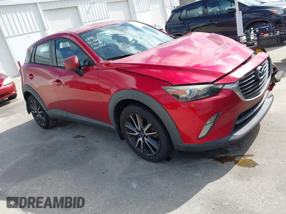 2018 Mazda CX-3 Touring with VIN JM1DKDC7XJ0318219, listed as a IAAI auction lot 41941104 with 86,186 mi miles. Bid and sale history available at carsss.com. Image 13.
