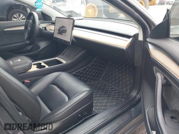 2022 Tesla Model 3 Long Range with VIN 5YJ3E1EB9NF206943, listed as a IAAI auction lot 41911040 with 69,920 mi miles and . Bid and sale history available at DreamBid. Image 5.