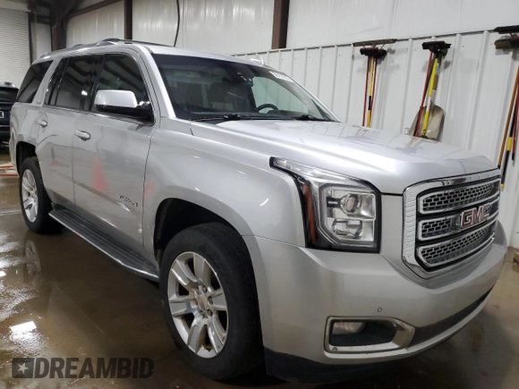 2015 GMC Yukon SLT with VIN 1GKS2BKC5FR615853, listed as a Copart auction lot 56153235 with 200,023 mi miles and Clean Title. Bid and sale history available at DreamBid. Image 4.