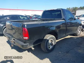 2003 Ford F-150 XL with VIN 1FTRF17223NA54202, listed as a IAAI auction lot 41535299 with Not Provided miles and . Bid and sale history available at DreamBid. Image 4.
