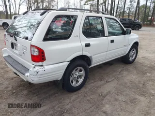 2000 Isuzu Rodeo S with VIN 4S2CK58W5Y4353808, listed as a IAAI auction lot 41723054 with 159,863 mi miles. Bid and sale history available at carsss.com. Image 4.
